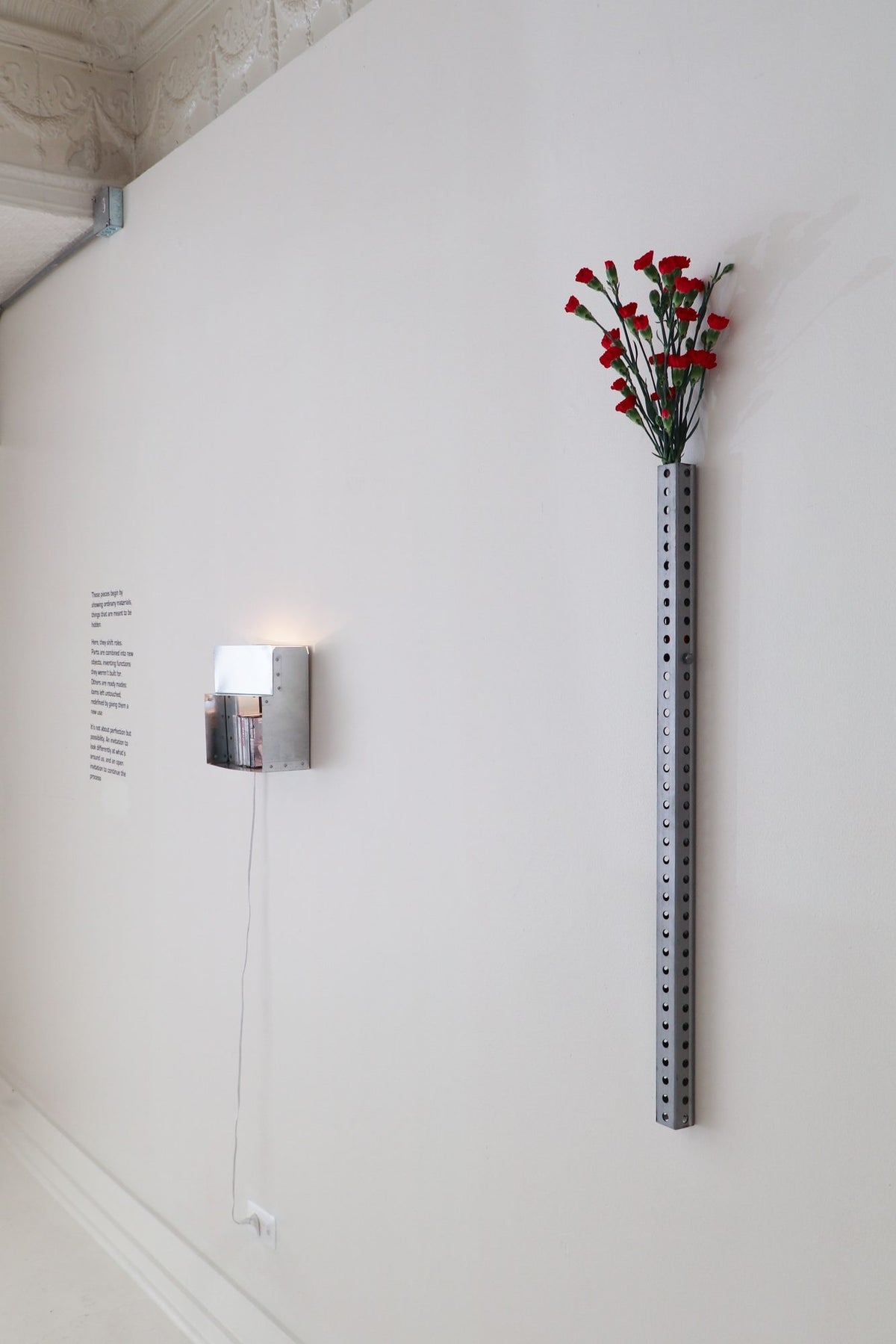 Perforated wall vase